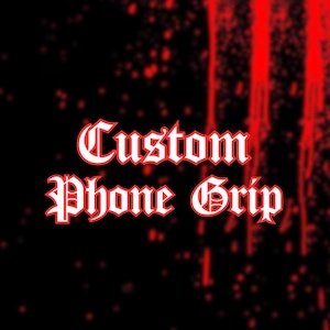 May include: Black background with red splatter and streaks. The words "Custom Phone Grip" are displayed in a gothic font with a white fill and red outline. The image is designed to promote custom phone grips.