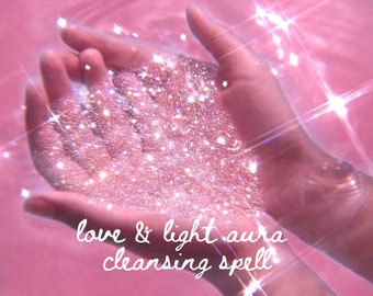 May include: Two hands cupped together in pink water with glitter and light reflecting off the surface. The text "love & light aura cleansing spell" is written below the hands.