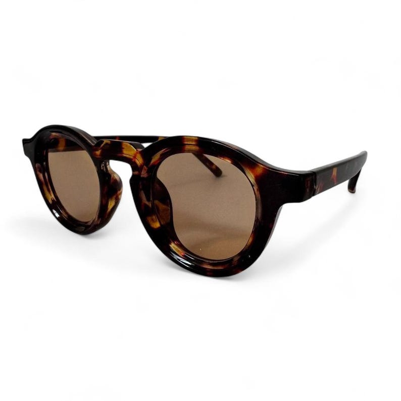 Round Tortoise Shell Sunglasses With Amber Tint Lenses Retro Keyhole round-tortoise-shell-sunglasses-with-amber-tint-lenses-retro-keyhole