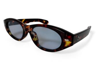 Gafas de sol ovaladas color marrón carey estilo vintage retro Y2K, transparentes, con protección UV400 y tinte azul, unisex.