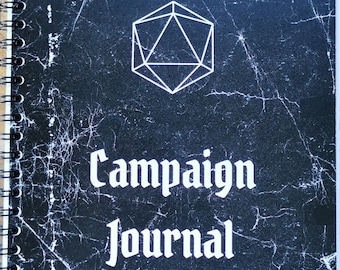May include: Black spiral bound journal with a white distressed design. The cover features a white outline of a twenty-sided die and the text "Campaign Journal".