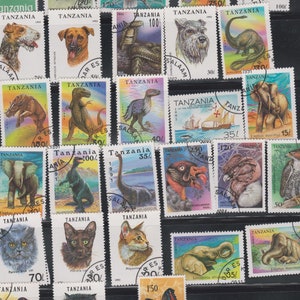 33 francobolli della Tanzania degli anni '90 raffiguranti animali. Gatti, cani, farfalle, insetti. Collezione di francobolli dell'Africa. Regalo. Effimere.