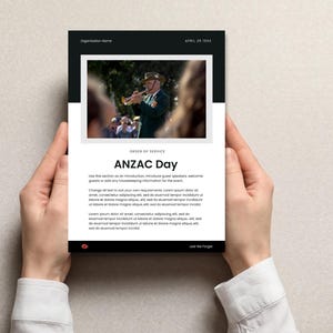 May include: A black and white document held by hands, featuring a photo of a man playing a trumpet. The document has the text "ANZAC Day" and other text. The date "April 25 2025" is at the top.