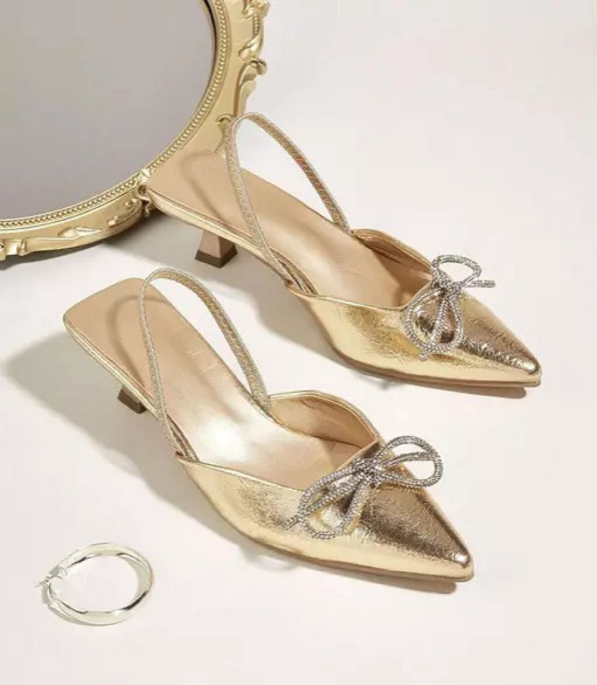 Black and cheap gold kitten heels