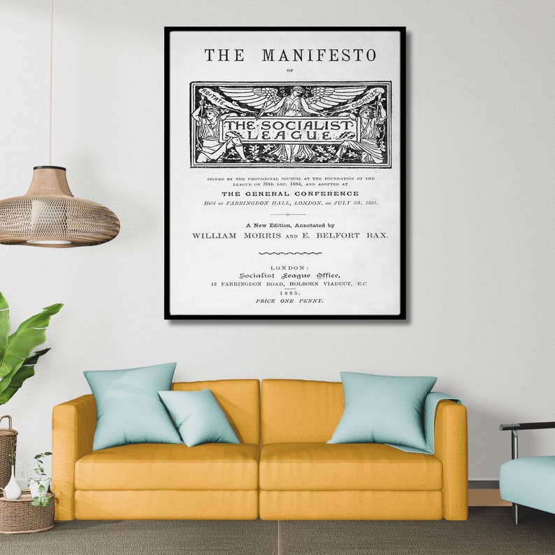May include: Black and white print of a vintage poster for "The Manifesto of The Socialist League." The poster features a winged figure with the text "The Socialist League" in a banner. The poster also includes the text "A New Edition, Annotated by William Morris and E. Belfort Bax." and "Price One Penny."