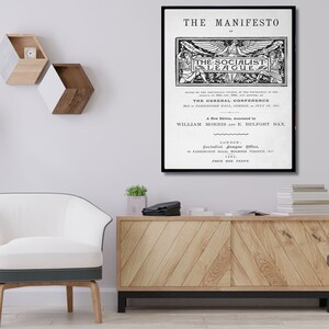 May include: Black and white print of "The Manifesto of The Socialist League" with the text "A New Edition, Annotated by William Morris and E. Belfort Bax." and "London: Socialist League Office, 13 Farringdon Road, Holborn Viaduct, E.C. 1885. Price One Penny."