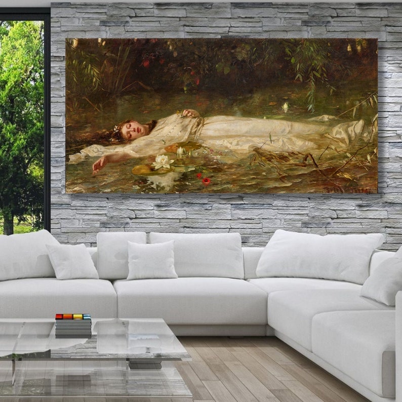 May include: A large rectangular canvas print of a classical painting. The artwork depicts a woman in a white dress floating in water, surrounded by lily pads and foliage. The color palette is muted with greens, browns, and whites.