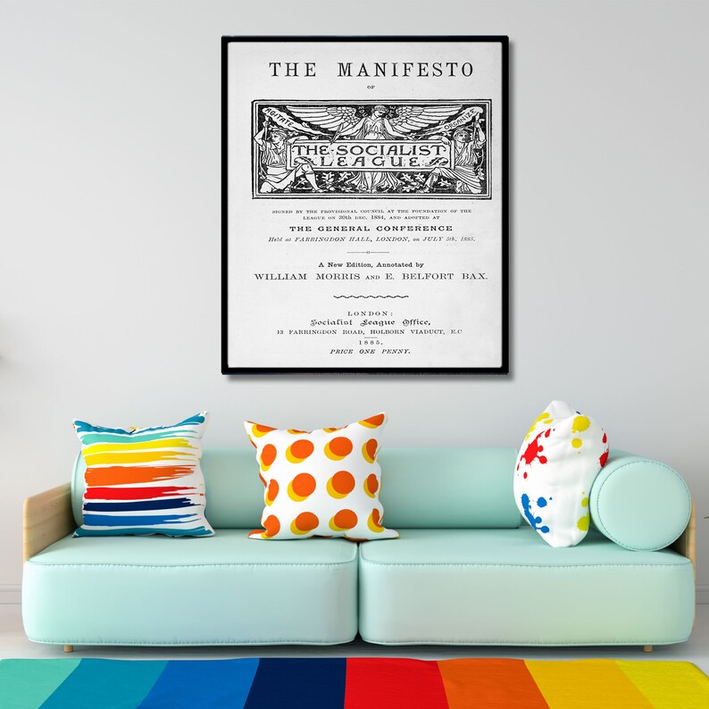 May include: A black and white image of a vintage poster for "The Manifesto of The Socialist League." The poster features a winged figure with a banner that reads "The Socialist League." The text below the image reads "A New Edition, Annotated by William Morris and E. Belfort Bax." The poster also includes the address of the Socialist League Office in London.
