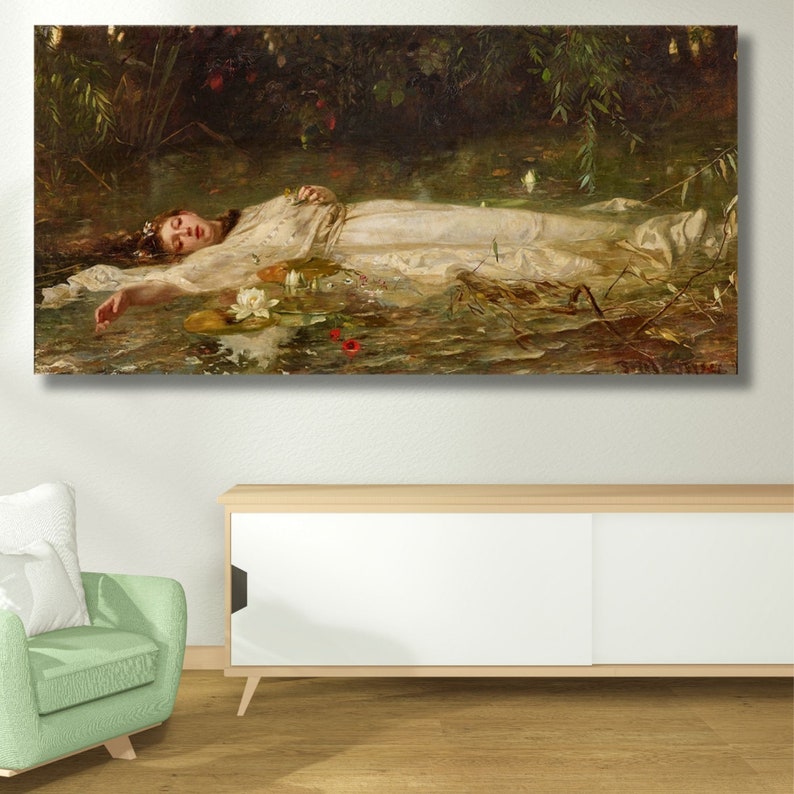 May include: A canvas print of a pre-Raphaelite painting depicting a woman in a white gown floating in a pond. The artwork features a serene scene with water lilies, red flowers, and lush greenery, evoking a sense of tranquility.