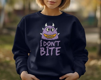 Funny "I Don't Bite" Monster T-Shirt, Quirky Purple Creature Tee, Graphic Casual Shirt for All Ages, Unique Cartoon Design Top