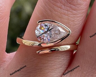 2.00 Ct Pear Moissanite Wedding Ring East West Bezel Set Moissanite Engagement Ring Solitaire Diamond Ring Yellow Gold Bridle Ring For Woman