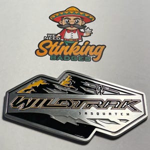 Bronco Wildtrak Badges New Style / Emblems Zinc Alloy, Not Plastic! Slightly smaller than OEM Size, so don’t place over the sticker.