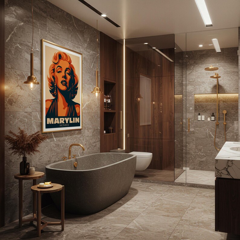 May include: A modern bathroom with a gray stone bathtub, a Marilyn Monroe poster, and a glass shower. The walls are covered in gray marble-like tiles. Two small wooden side tables with decorative items are next to the bathtub.