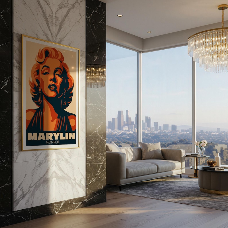 May include: A framed art print featuring a stylized portrait of Marilyn Monroe. The artwork has a gold frame and a color palette of orange, navy, and beige. The print is displayed in a modern living room with a city view.