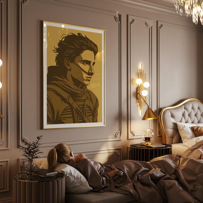 May include: A framed art print featuring a stylized portrait of a person in shades of brown and gold. The artwork has a minimalist aesthetic, with clean lines and a focus on the subject's profile. The print is displayed in a bedroom setting.