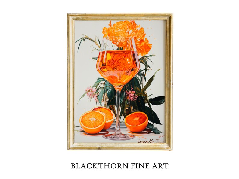 May include: A framed painting of a glass of orange juice with orange slices and flowers. The painting is in a gold frame and has a white background.