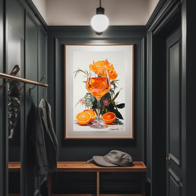 May include: A framed print of a glass of orange juice with orange slices and a flower arrangement. The print is titled "Sparkle Day".