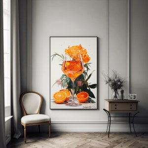 May include: A painting of a glass of orange juice with orange slices and orange blossoms. The painting is signed "Sparkle" in the bottom right corner.