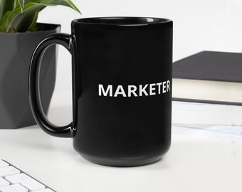 Marketer / Taza negra brillante