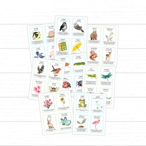 May include: A set of 24 colorful illustrated cards featuring animals and actions. Each card has a watercolor illustration of an animal and a word describing an action. The words include: glow, slither, flap, soar, run, chirp, slide, squat, twist, march, crawl, spin, roll, blossom, buzz, walk, waddle, scamper, gallop, kick, hover, shuffle, wiggle, stand, sway, jump, whirl, hop, flutter, sprout, and balance.