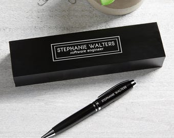 May include: A black pen with silver accents and the name "Stephanie Walters" engraved on it. The pen is in a black box with the same name and the title "software engineer" engraved on it.