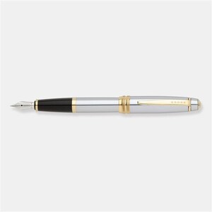 May include: A silver and gold Cross fountain pen with a black ink cartridge.