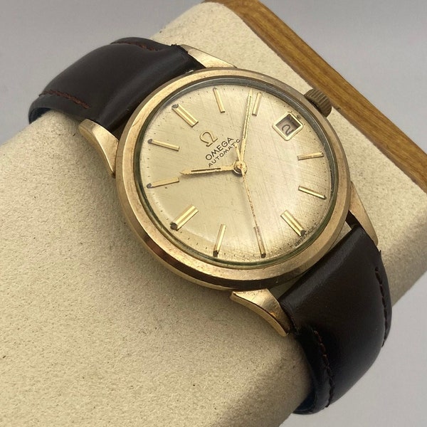 Vintage 1960’s Omega Automatic Watch with Gold Linen Dial and Rare Caliber 560 Movement