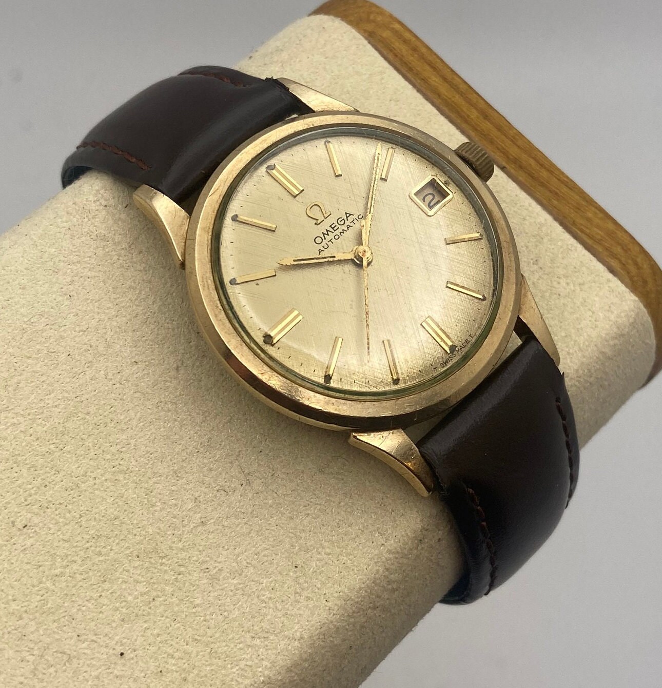 Vintage 1960 s Omega Automatic Watch with Gold Linen Dial and Rare Caliber 560 Movement