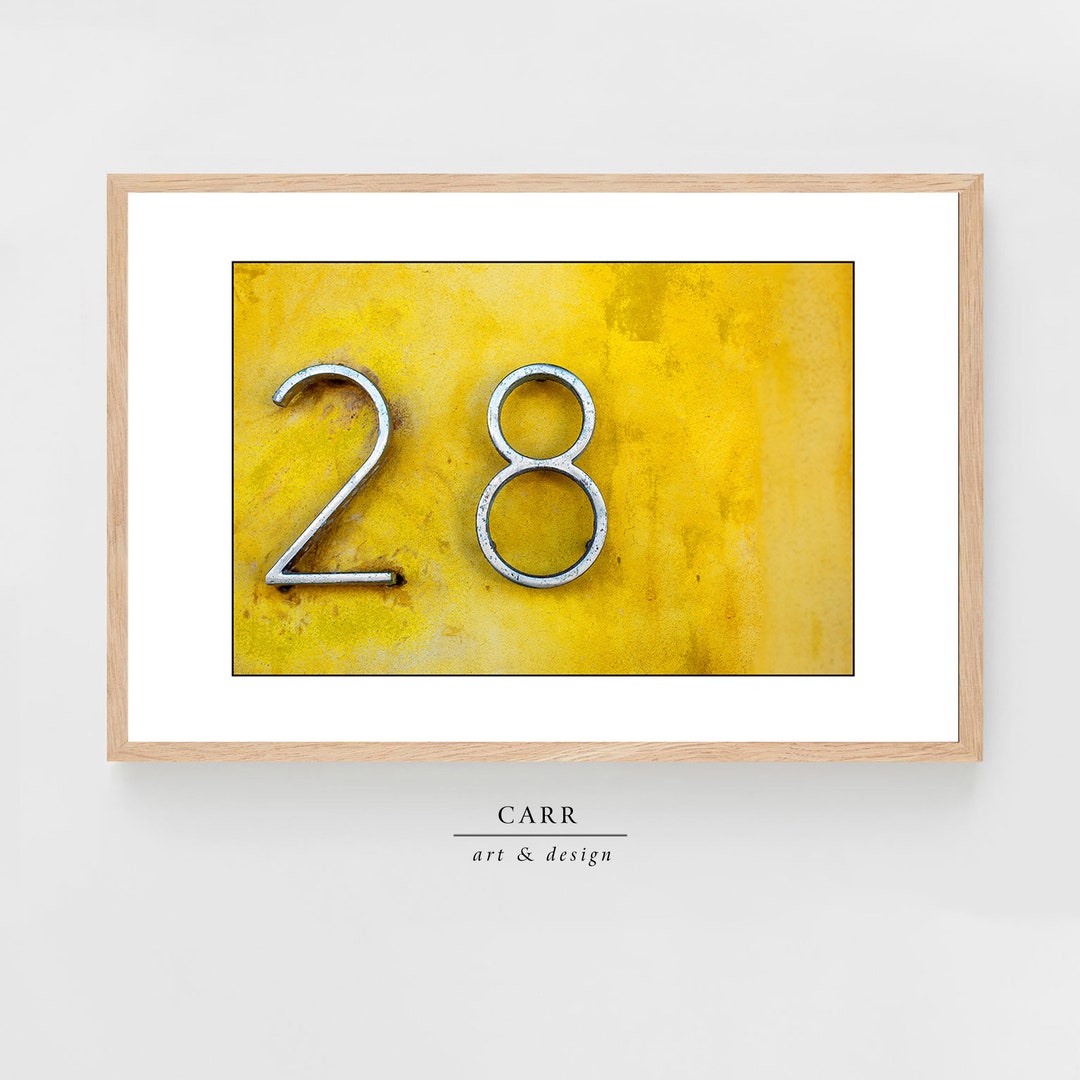 28 Colorful Photo With Timeless Appeal: Vintage-inspired Yellow Wall Decor With 28 Number Accent 