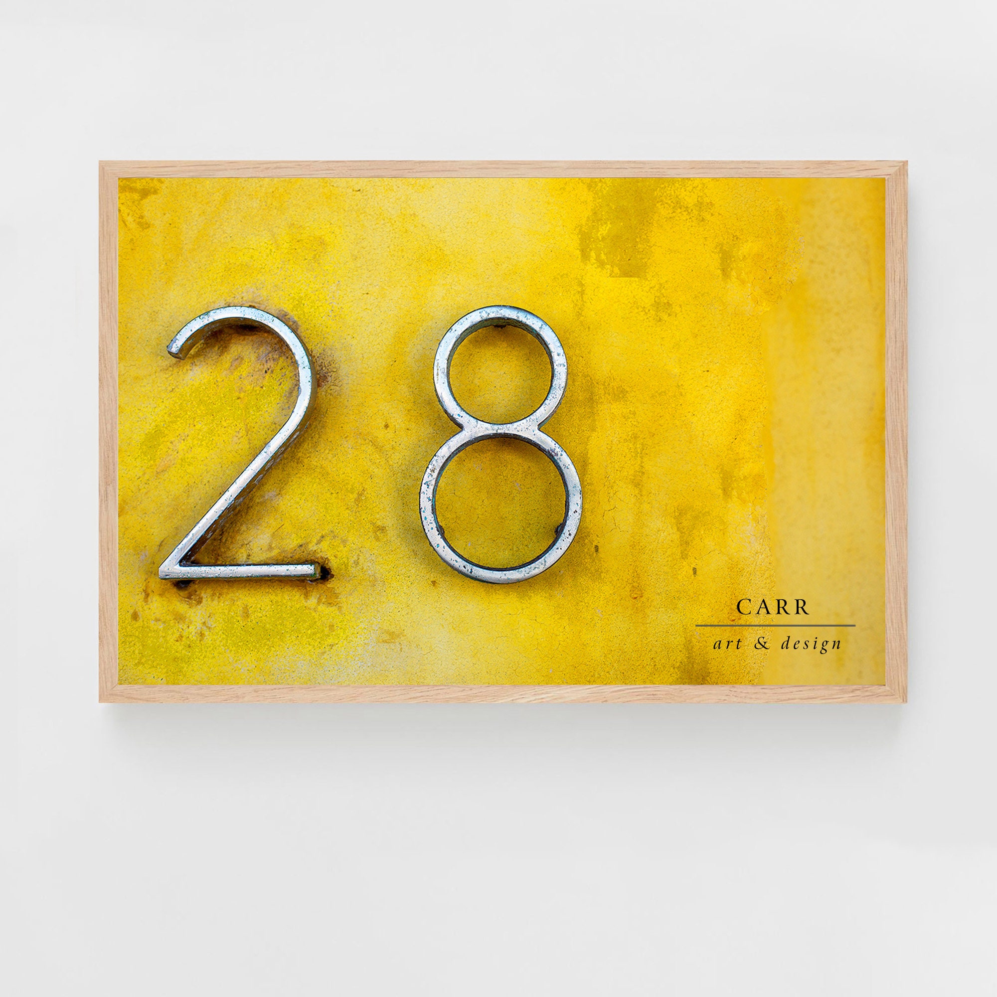 28 Colorful Photo With Timeless Appeal: Vintage-inspired Yellow Wall Decor With 28 Number Accent 
