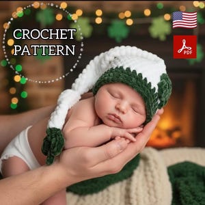 Peut inclure: Un bébé portant un bonnet au crochet blanc et vert avec une longue pointe. Le chapeau fait partie d'un modèle de crochet, comme l'indique le texte "CROCHET PATTERN" sur l'image. Le bébé repose dans les mains de quelqu'un.