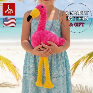 May include: A handmade pink crochet flamingo with yellow legs and a yellow and black beak. The flamingo is being held by a person wearing a blue dress. The image includes the text "CROCHET PATTERN & GIFT" and a PDF icon.