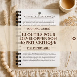 May include: A spiral-bound notebook with white pages featuring black text titled JOURNAL DE L'ESPRIT CRITIQUE, COMPRENDRE D'OU TU REGARDES, JOURNAL GUIDÉ, 10 OUTILS POUR DÉVELOPPER SON ESPRIT CRITIQUE, and PDF IMPRIMABLE in a clear font.