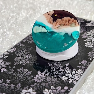 Phone or Tablet pop up grip/stand