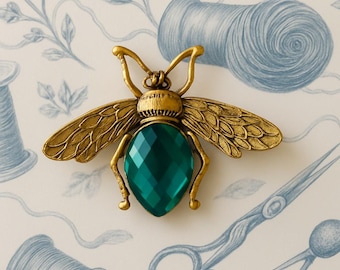 Buzzworthy Beauty Gold and Emerald Bee Needle Minder