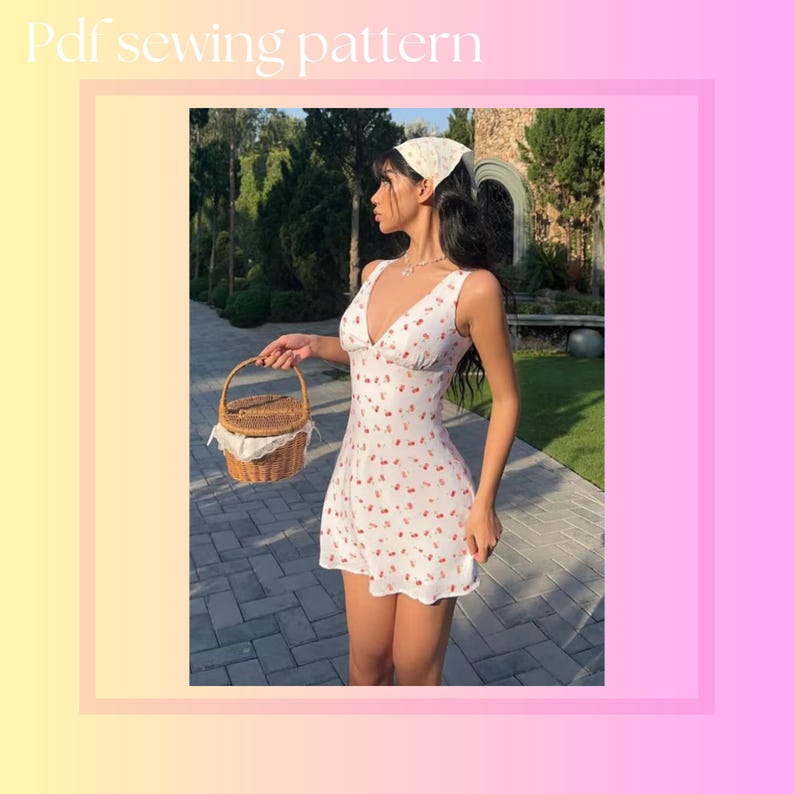 May include: White mini dress with a V-neck and red cherry print. The dress is sleeveless and has a fitted bodice. The image also shows a woven basket with a handle and a white scarf. The text "Pdf sewing pattern" is at the top.
