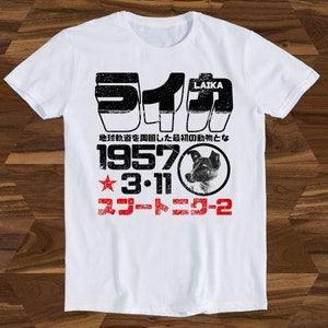 Laika Japoński plakat 1957 Kosmos CCCP Smutna historia Astronauta Pies Bestseller Zabawny T-shirt Prezent Unisex Top Tee T1472
