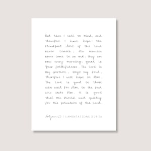 May include: A white print with handwritten text. The text includes a quote from Lamentations 3:21-26, discussing hope and faith. The print has a minimalist design, suitable for home decor or as a gift.