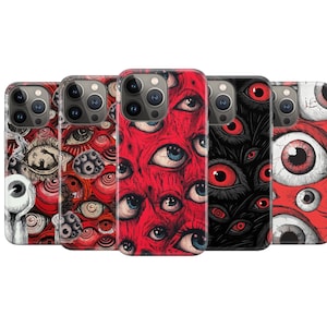 May include: Five smartphone cases arranged in a row, each featuring a detailed graphic pattern of numerous human-like eyes. The designs utilize a color palette of deep red, black, and white, with varying eye sizes and densities across each case.