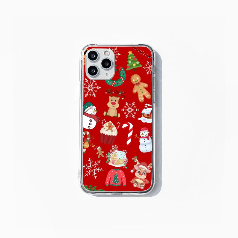 May include: A clear phone case with a red background and a Christmas-themed design. The design features various Christmas icons, including a snowman, a gingerbread man, a reindeer, a Christmas tree, and candy canes.