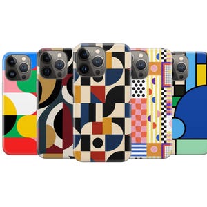 May include: Five smartphone cases arranged in a row, each featuring distinct geometric patterns and vibrant color palettes including red, yellow, blue, black, and cream. The cases display various shapes like circles, squares, and grids.