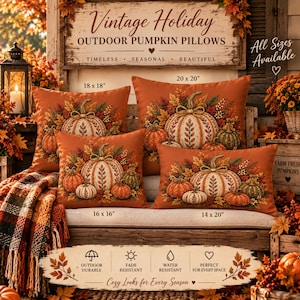 May include: Four square and rectangular orange throw pillows featuring a printed design of white pumpkins surrounded by autumn leaves. The pillows are labeled with sizes 18x18 inches, 20x20 inches, 16x16 inches, and 14x20 inches, displayed on a wooden bench.