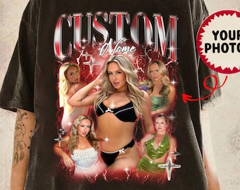 May include: Dark gray t-shirt with a graphic design featuring the word "CUSTOM" in a red and silver font, with the word "Name" below. The design includes multiple images of a woman. A red circle with the text "YOUR PHOTOS" is on the right.