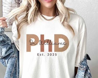 PhD Graduation Shirt - Custom Doctorate T-Shirt with Name, Personalized PhD Graduate Gift for New Doctor, Doctor Graduation Tee 2025 For Her