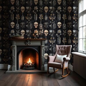 May include: A black and white wallpaper with a repeating pattern of skulls and floral designs. A fireplace with a lit fire is in the foreground, and a rocking chair is in the corner of the room.