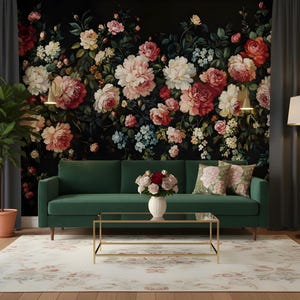 May include: A living room scene featuring a dark green sofa, a gold-framed coffee table, and a floral rug. The backdrop is a floral wallpaper with pink and red roses. Gray curtains frame the scene, and a potted plant and floor lamp add to the decor.