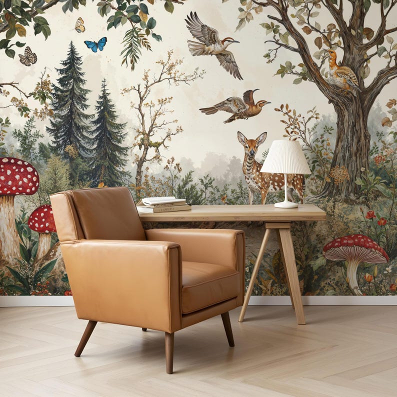 May include: A brown leather armchair sits in front of a wall mural depicting a forest scene with a deer, birds, mushrooms, and trees. The mural is painted in a vintage style with muted colors.