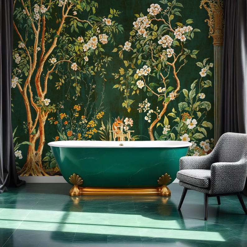 May include: A green freestanding bathtub with gold feet sits in a bathroom with a green and white floral wallpaper. A black and white patterned armchair is in the foreground.