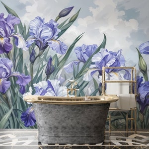 May include: A bathroom with a freestanding bathtub and a floral wallpaper featuring purple and white irises. The wallpaper has a light blue background with white clouds.
