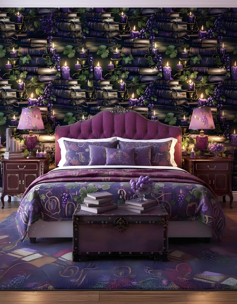 May include: A bedroom with a purple and dark blue theme. The bed features a buttoned headboard and is dressed with a patterned duvet and pillows. A trunk is at the bed's foot, and the walls are adorned with wallpaper depicting books, candles, and grapes.